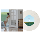 Roommates 7-inch vinyl insert photo of a woman in a beige slip dress by a glass door, beside the Side A record label