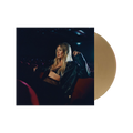 Gold vinyl record in sleeve featuring Hilary Duff seated in red theater seats wearing a black leather jacket