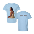 Light blue t-shirt shown front and back, front has a photo of Hilary Duff in a tan dress, back has hilary duff text