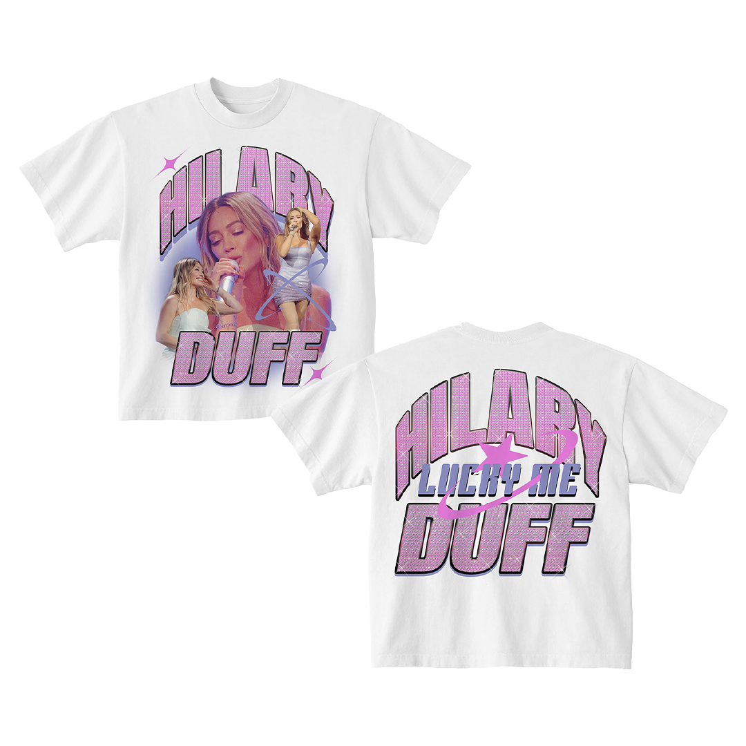 White t-shirt flat lay, front collage photo of Hilary Duff performing and back Hilary Lucky Me Duff glitter logo